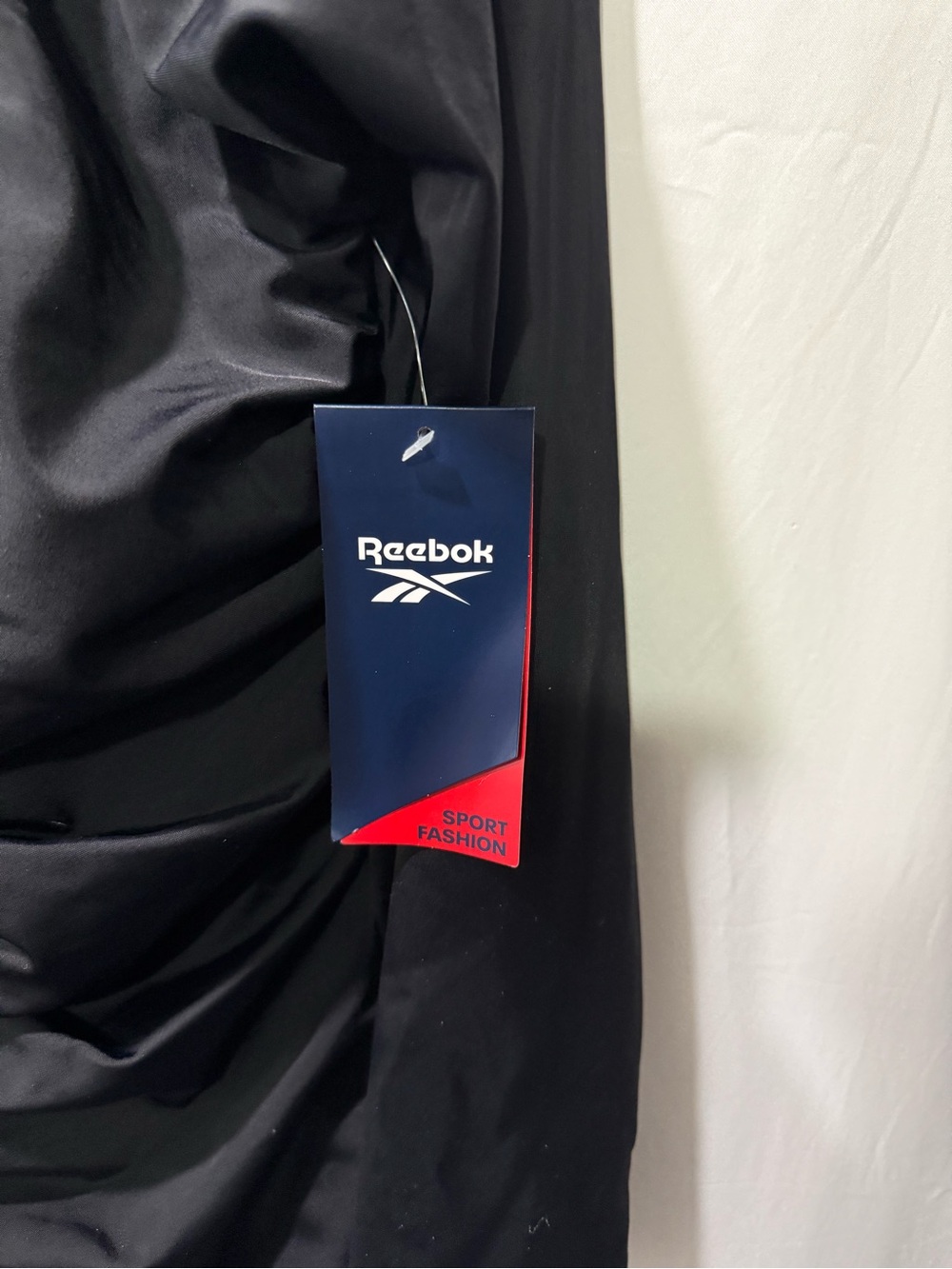 Reebok Black One-Piece Swimsuit with Navy and Red Tag Detail - Picture 2 of 4
